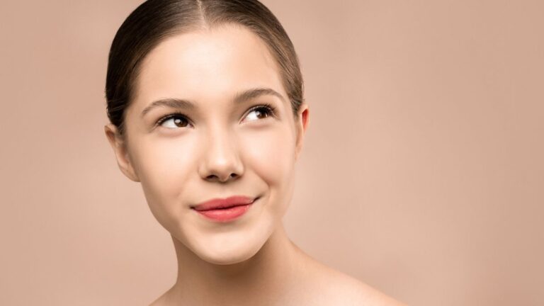 Woman with smooth, radiant skin after face hair removal